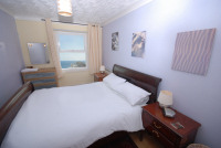 Double bedroom with spectacular sea views
